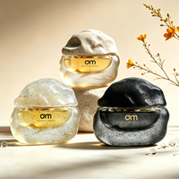 Fabricant de flacons de parfum en verre givré propose des contenants de luxe personnalisables de 50 ml/100 ml de forme unique avec pulvérisateur – Usine OEM/ODM