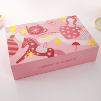Boîte cadeau pliable de luxe en carton rigide mat rose avec logo doré et fermeture magnétique