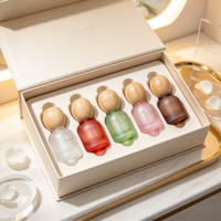 Flacons compte-gouttes en verre givré de luxe de 10 ml avec boîte cadeau haut de gamme sérigraphiée pour ensemble d'huiles essentielles et de soins de la peau