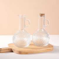 Bouteille de sauce soja en verre transparent rond de 250 ml avec bec verseur pour huile comestible et vinaigre, idéale pour les condiments de cuisine (OEM)