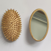 Peigne de massage en bois de hêtre à marque privée avec masseur de cuir chevelu, brosse à cheveux ovale portable à coussin d'air avec aiguilles en bambou et acier, mini-airbag