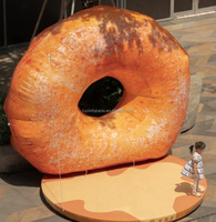 Nouveau design géant de beignet bagel doré brun gonflable, texture réaliste de pain, forme annulaire, pour affichage publicitaire d'événements alimentaires en extérieur