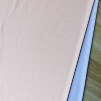 Poliéster cationico gris jaspeado con elastano, punto sencillo de 180 g/m², tejido atlético transpirable, elástico y resistente a las arrugas para niñas.