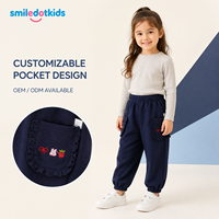 Smiledotkids Pantalon de jogging personnalisé pour enfants, bleu marine, poche à volants, nœud rouge, doux, OEM ODM, pour petites filles, vente en gros