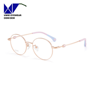 Monture de prescription ronde en titane sur mesure OEM, anti-lumière bleue, pour enfants et adolescents, taille 47-17-142, fabricant professionnel