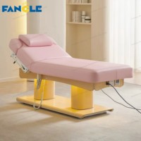 Lit de massage électrique rose de luxe moderne lit facial de salon de beauté lit de beauté à 4 moteurs lit de cils