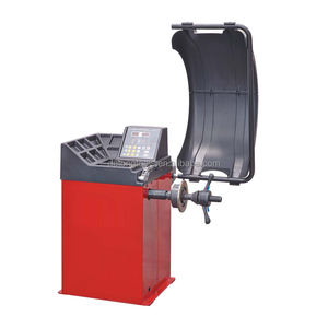 Máquina equilibradora de ruedas de neumáticos de coche de alta calidad, equipo de servicio de coche para Taller de neumáticos, salida de fábrica - Product Image 1