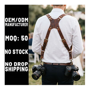 <span class=keywords><strong>Harnais</strong></span> pour appareil photo reflex numérique en cuir véritable, durable, à double sangle d'épaule, personnalisé par le fabricant OEM, pour la photographie de mariage - Product Image 1