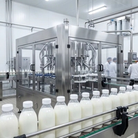 Machine de remplissage et de bouchage automatique hygiénique pour bouteilles en PET et en verre de 500 ml et 1000 ml pour lait frais