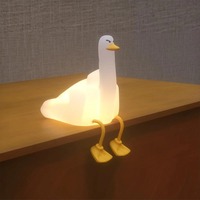 Haute qualité mignon allumer canard canard lampe Silicone LED pépinière veilleuse support pour téléphone portable LED Squishy canard veilleuse