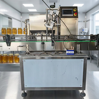 Machine de remplissage automatique de liquides et de pâtes, personnalisable en usine, pour le miel.