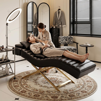 Lit de beauté de luxe en velours marron-gris pour extensions de cils, avec réglage du cou, base en acier inoxydable et design incurvé