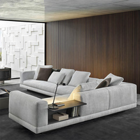 Canapé d'angle italien léger de luxe rembourré en lin en forme de L avec pieds en acier inoxydable pour villa, salon, design minimaliste
