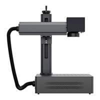Machine de marquage laser à fibre de bureau Huike 20W, prend en charge la gravure laser personnalisée de motifs graphiques et de textes sur bagues, bracelets et bijoux.