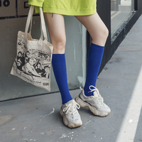 Nouvelles chaussettes longues de style coréen pour l'automne et l'hiver, chaussettes de mollet couleur bonbon, chaussettes hautes jusqu'aux cuisses