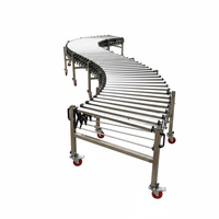 Système d'automatisation de machine d'emballage à convoyeur à tambour motorisé en acier inoxydable 304 avec balance de levage et roue à chaîne à rouleaux, haute efficacité, faible consommation