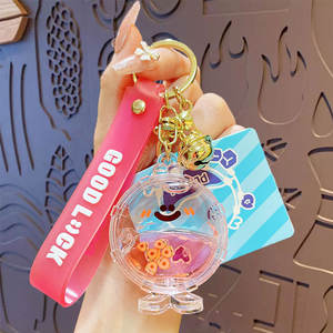 Hecion พวงกุญแจใบหน้าอีโมสีสันของเหลว, พวงกุญแจแฟชั่นจี้กระเป๋านักเรียนพวงกุญแจอะนิเมะ4สี - Product Image 2