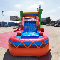 Structure gonflable commerciale Fiesta avec toboggan et château sauteur, capacité 500 kg, portable pour fêtes d'enfants en extérieur, garantie 3 ans
