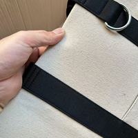 Sac fourre-tout de voyage en toile avec manchon pour bagage, anneaux en D et poches organisatrices pour voyages d'affaires et personnalisation de logo en gros