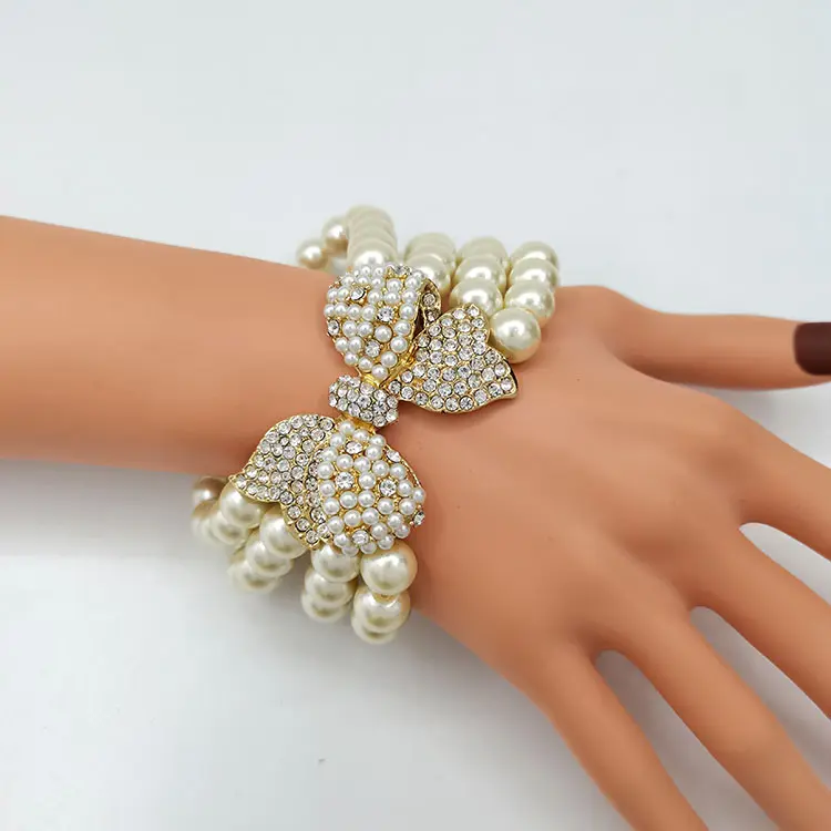 Pulsera de perlas de imitación barrocas multicapa para mujer, accesorios de joyería para fiesta, con lazo de Metal dorado y diamantes de imitación