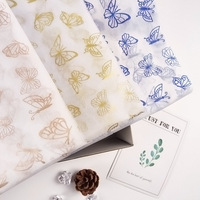 Papier de soie romantique à découpes papillon filigranées pour le rembourrage des boîtes de dragées de mariage et l'emballage de cadeaux de fête prénuptiale
