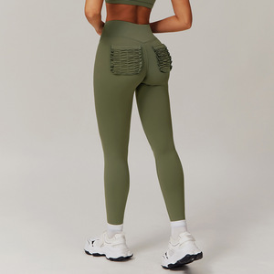 Leggings da donna con elastico a vita alta e con scriccia sul retro e senza cuciture pantaloni in Spandex ad asciugatura rapida con tasche in tinta unita abbigliamento sportivo - Product Image 5