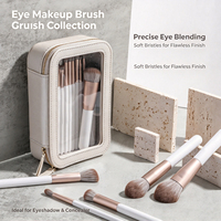 Ensemble de pinceaux de maquillage de luxe blancs 18 pièces avec manche en bois doré et poils synthétiques pour l'application de poudre sur le visage