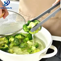 Pince de cuisine multifonctionnelle en silicone résistante à la chaleur avec poignée tridimensionnelle, personnalisable avec logo, en promotion