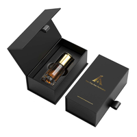 Boîte cadeau personnalisée en carton rigide noir de luxe avec fermeture magnétique pour sérum de soin de la peau avec doublure en éponge