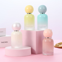 Flacon de parfum en verre rond de luxe de 30 ml avec bouchon en forme de boule de différentes couleurs