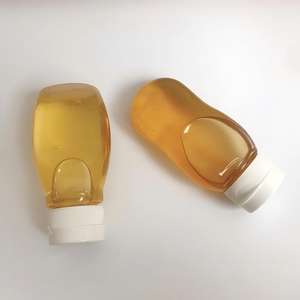 Bouteille de <span class=keywords><strong>miel</strong></span> mini en plastique PET de 72 ml 100 g, pot d'emballage vide, bouteille souple pour <span class=keywords><strong>miel</strong></span>, petit récipient sérigraphié avec bouchon en silicone - Product Image 2