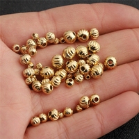 Perles d'espacement rondes en acier inoxydable plaqué or 18 carats, motif sergé citrouille, pour la fabrication de bijoux et composants de colliers - Vente en gros