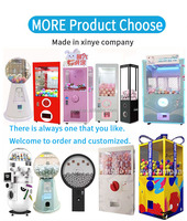Machine distributrice de capsules de bonbons Gachapon japonaise avec jetons Gacha et cartes surprise, pour la vente de jouets Gachapon et de grandes capsules.