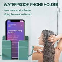 Stock populaire nouveau support de téléphone mural support de chargeur mural adhésif pour téléphone portable et support de télécommande