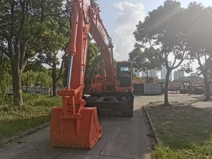 Excavatrice sur pneus d'occasion Doosan DH210 21T, d'origine coréenne, certifiée CE, faible consommation, avec accessoire tarière, moteur Doosan - Product Image 3