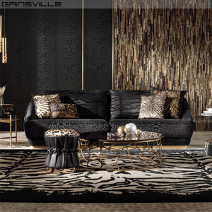 Ensemble de canapés de luxe italiens en cuir véritable de forme unique en or noir pour salon et appartement - Product Image 4