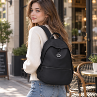 Sac à dos pour femme en tissu nylon avec poche avant, emblème rond, pour usage quotidien, bretelles réglables, OEM ODM, vente en gros, MOQ 10 pièces