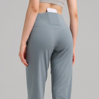 Pantalon de yoga taille haute pour femme, couleur unie, longueur mollet, jambe large, respirant, séchage rapide, extensible dans les 4 sens, poches latérales, pour gym et fitness