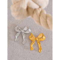JINYOU 4223 2025 acier inoxydable métal noeud noeud broches 18K PVD plaqué pour femmes imperméable vêtements accessoires cadeau de noël