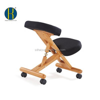 Chaise ergonomique noire à genoux avec siège réglable en hauteur et coussins rembourrés pour la posture au bureau