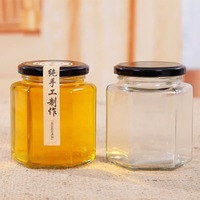 Hexagon Tebal Makanan Penyimpanan Botol Berbagai Ukuran Kaca Guci Madu dengan Disegel Logam Tutup