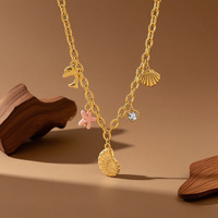 Moda de acero inoxidable 18K chapado en oro enlace estrella de mar Concha delfín colgante mujeres gargantillas collar elementos marinos en forma de corazón