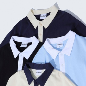 Polo personnalisé à blocs de couleur, polo de golf décontracté respirant à manches courtes pour homme - Product Image 1