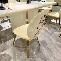 Ensemble de table et de chaises de salle à manger italien de luxe moderne pour 8 personnes avec marbre, bois et acier inoxydable