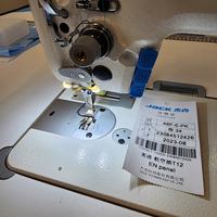 Machine à coudre à point noué simple aiguille Jack A6F avec coupe-fil automatique intelligent pour la production de vêtements en série professionnelle