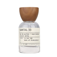 Flacon pulvérisateur de parfum rond en verre transparent rechargeable avec bouchon en bois 30ml/50ml/100ml pour emballage cosmétique et parfum, OEM/ODM disponible