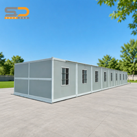 Conteneur mobile auto-pliant de 20 pieds, maison préfabriquée portable, deux chambres, un salon, maison pliable préfabriquée avec remorque