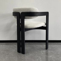 Fauteuil de salle à manger nordique moderne en bois de frêne massif noir avec rembourrage à boucle blanche durable pour hôtel et restaurant