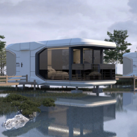 Capsule hôtelière mobile préfabriquée en acier, type Smart House, pour bureau ou atelier, avec véranda.