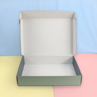 Emballage d'expédition pliable rose au design délicat, en carton ondulé, avec logo personnalisé en relief, pour cadeaux de luxe